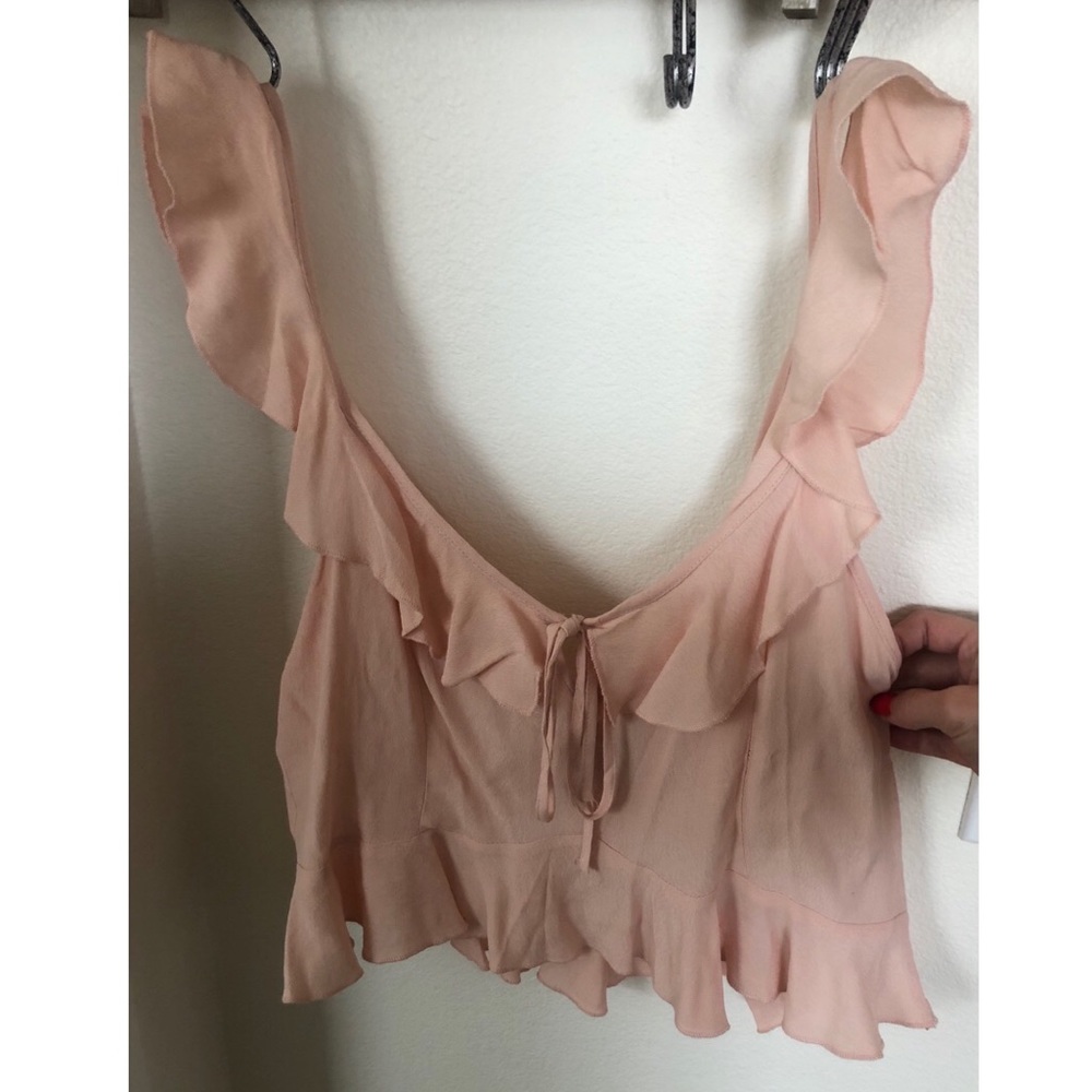 Light pink ruffled crop top